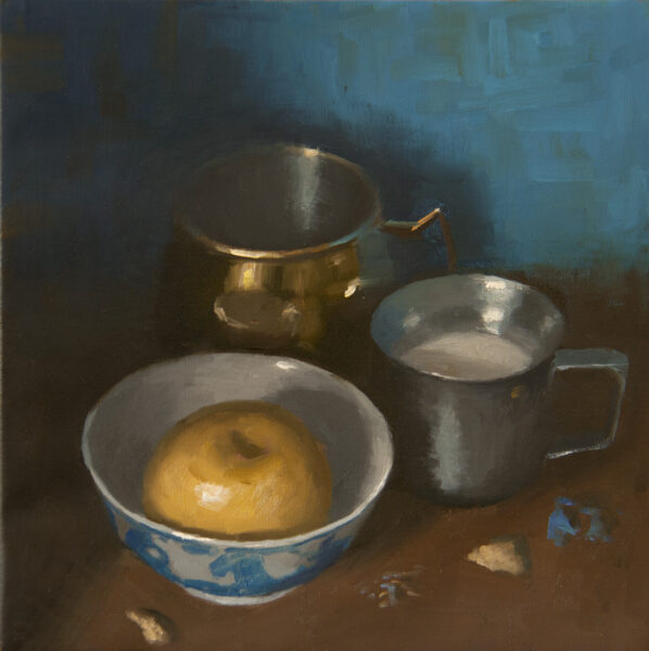 Milk jug and apple