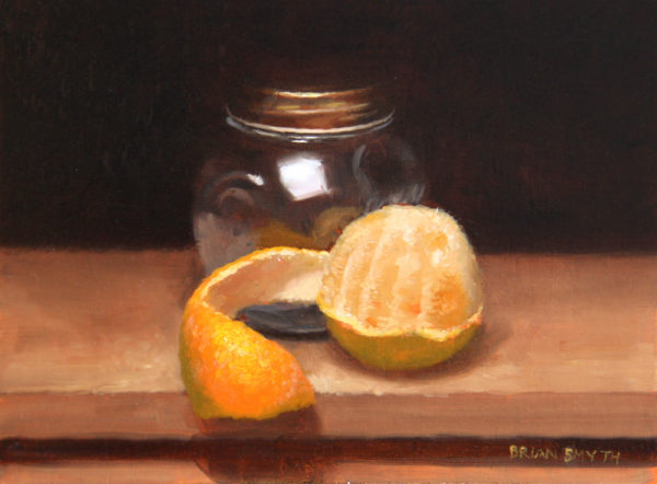 Peeled orange and jar