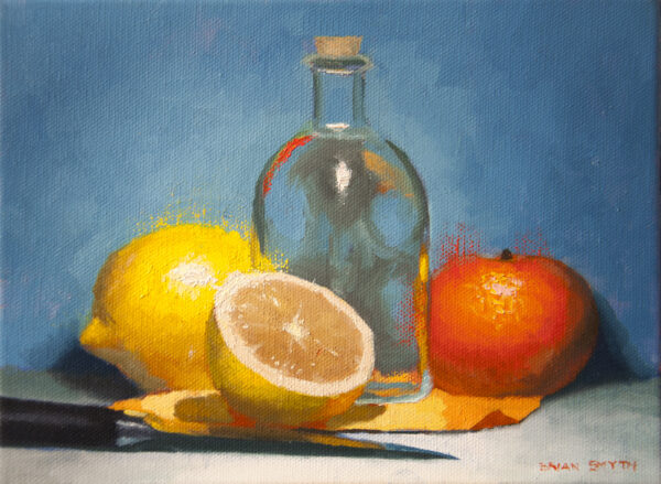Lemons oranges and a glass jar